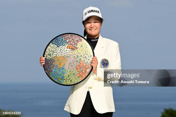 Sora Kamiya of Japan poses with the trophy after winning the tournament following the final round of 41st Fujisankei Ladies Classic at Kawana Hotel...