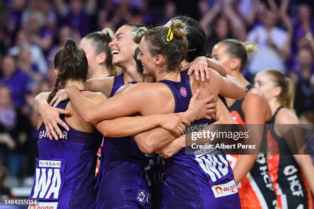 Queensland Firebirds celebrate victory during the round six Super Netball match between the Queensland Firebirds and the Giants Netball at Nissan...