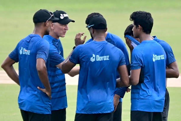 Bangladesh's bowling coach Allan Donald speaks with his team players during a practice session at the Zahur Ahmed Chowdhury Stadium in Chittagong on...