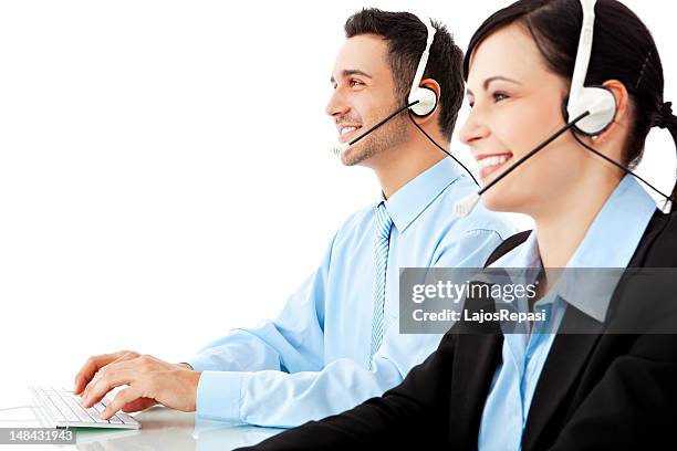 a young man and woman working as help desk operators - delivery person on white stock pictures, royalty-free photos & images