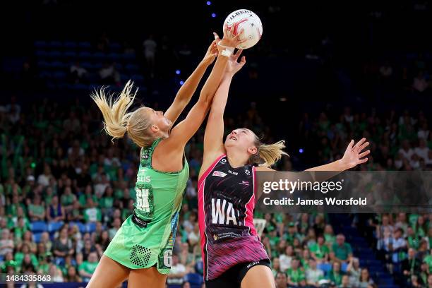 Rudi Ellis of the Fever and Georgie Horjus of the Thunderbirds contest for the ball during the round six Super Netball match between West Coast Fever...