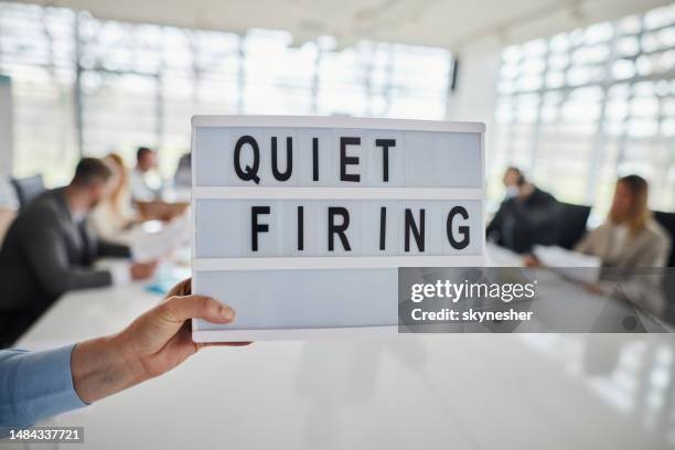 quiet firing in progress! - being fired stock pictures, royalty-free photos & images