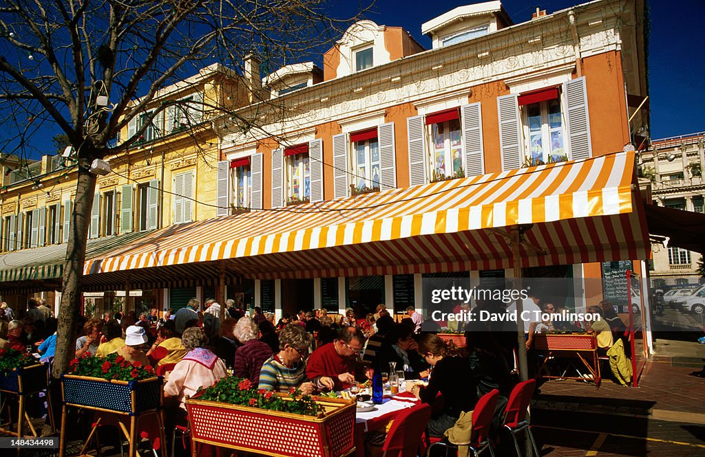 Colourful restaurants and crowds in Cours Saleya.