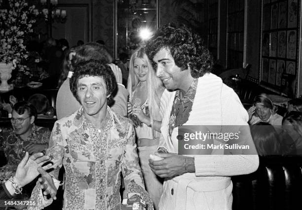 Singers Frankie Valli and Engelbert Humperdinck attend an after party at The Brown Derby, Hollywood, CA 1975.