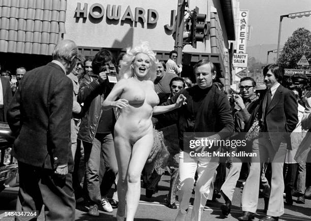 Actress/Dancer Liz Renay streaks on Hollywood and Vine at high noon, as a promotional stunt for her local burlesque show, Hollywood, CA 1974.