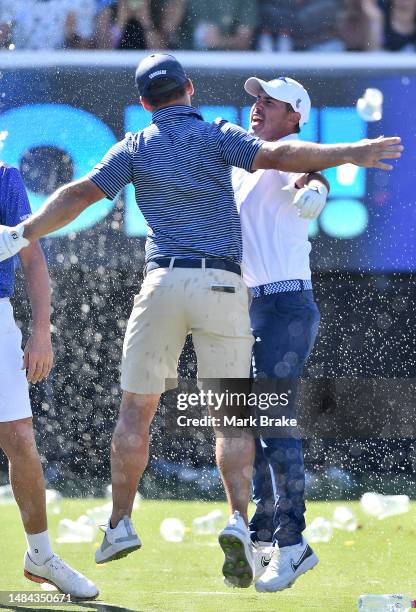 Chase Koepka of the Smash celebrates a hole in one on the 12th with Paul Casey of the Crushers during day three of Liv Golf Adelaide at The Grange...