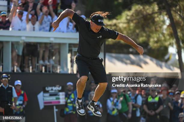 Pat Perez of 4Aces GC jumps in celebration after making a birdie on the 12th hole during day three of Liv Golf Adelaide at The Grange Golf Course on...