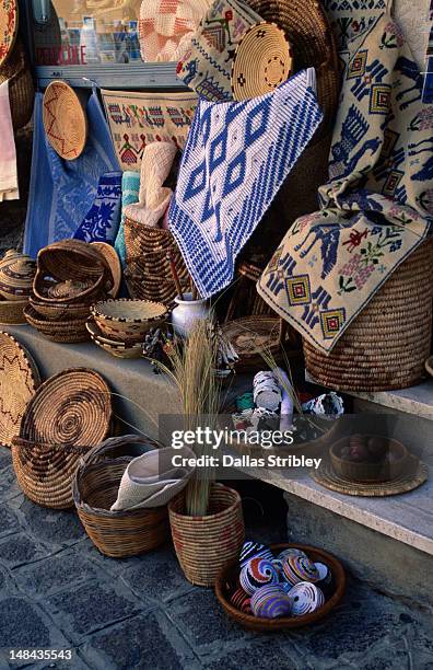local handicrafts, basketware and carpets for sale in castelsardo. - sardinien stock-fotos und bilder