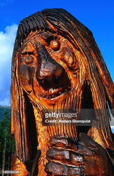a giant wooden troll, a mythical figure from norwegian folklore. - troll - fotografias e filmes do acervo