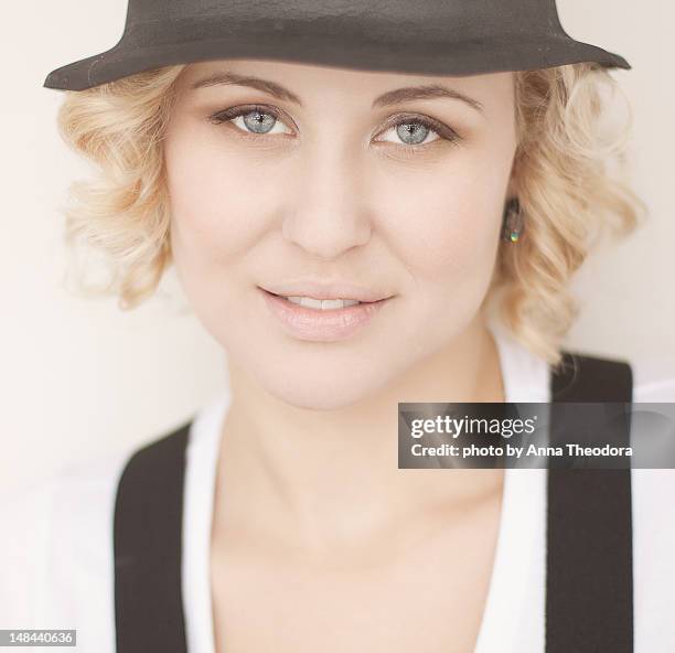 portrait of blond woman - close up of beautiful young blonde woman with black hat stock pictures, royalty-free photos & images