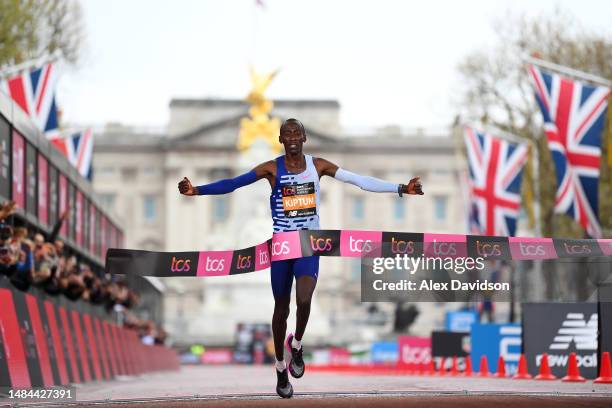 Kelvin Kiptum of Kenya crosses the finish line to win the Elite Men's Marathon during the 2023 TCS London Marathon on April 23, 2023 in London,...