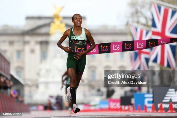 Sifan Hassan of Netherlands celebrates while crossing the finish line to win the Elite Woman's Marathon during the 2023 TCS London Marathon on April...