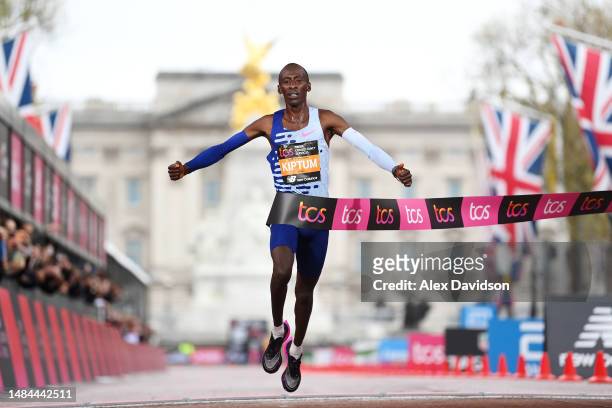 Kelvin Kiptum of Kenya crosses the finish line to win the Elite Men's Marathon during the 2023 TCS London Marathon on April 23, 2023 in London,...
