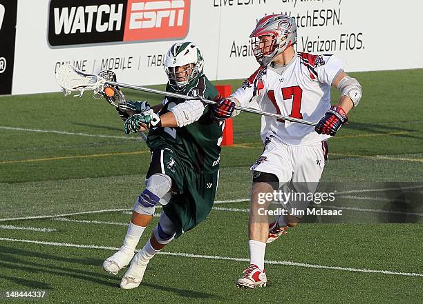 Greg Gurenlian of the Long Island Lizards in action against Kyle Sweeney of the Boston Cannons during their Major League Lacrosse game on July 14,...