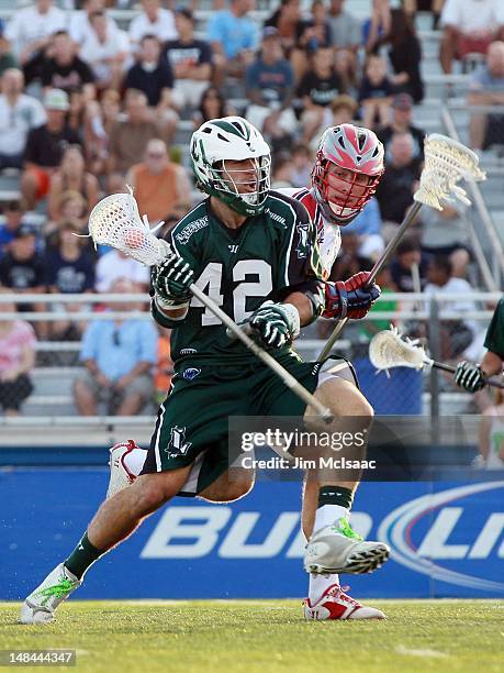 Max Seibald of the Long Island Lizards makes a move against Kyle Sweeney of the Boston Cannons during their Major League Lacrosse game on July 14,...