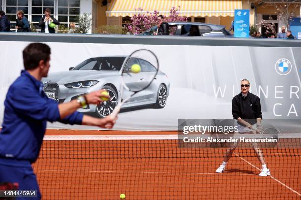 Lena Gercke plays a fun match with Mischa Zverev during day nine of the BMW Open by American Express at MTTC IPHITOS on April 23, 2023 in Munich,...