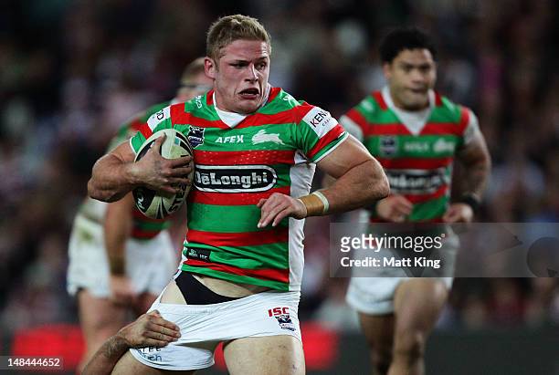 George Burgess of the Rabbitohs is tackled during the round 19 NRL match between the Sydney Roosters and the South Sydney Rabbitohs at Allianz...