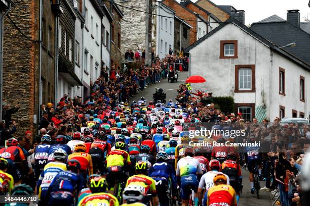 General view of the peloton compete climbing to the Côte de Saint-Roch during the 109th Liege - Bastogne - Liege 2023, Men's Elite a 258.1km one day...