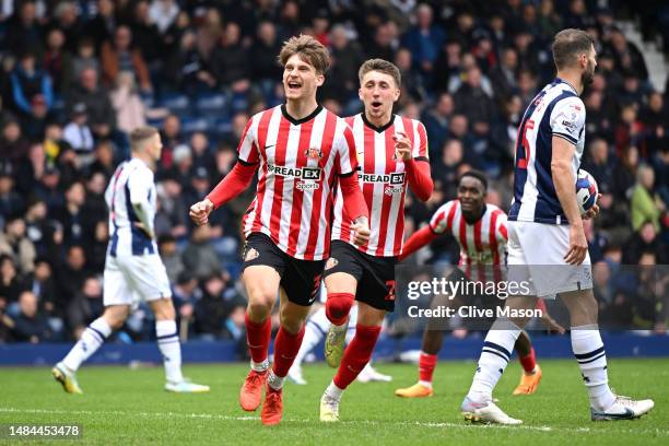 Dennis Cirkin of Sunderland celebrates alongside teammate Dan Neil after scoring Sunderland's first goal during the Sky Bet Championship between West...