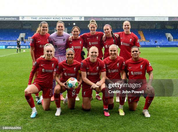 Liverpool FC women line up for a team photograph holding a SDG ball before the FA Women's Super League match between Liverpool and Brighton & Hove...