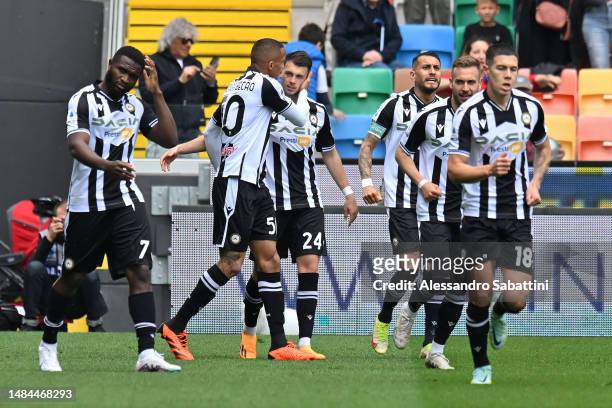 Lazar Samardzic of Udinese Calcio celebrates with teammates after scoring the team's first goal during the Serie A match between Udinese Calcio and...