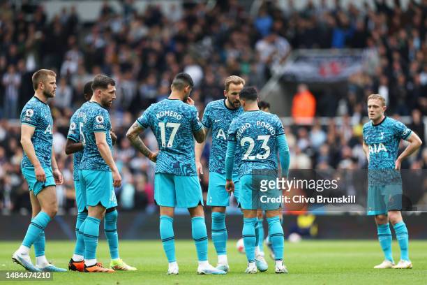 Harry Kane of Tottenham Hotspur speaks to teammates after Newcastle United scored their sides fifth goal during the Premier League match between...