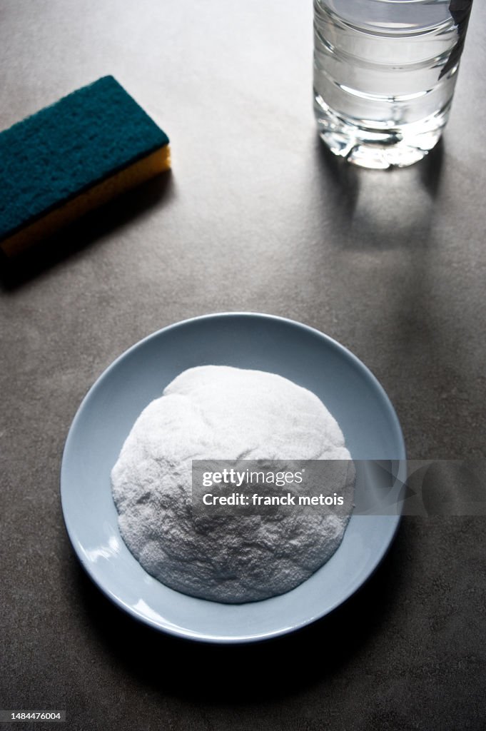 Sodium bicarbonate + white vinegar and sponge