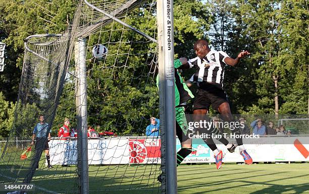 Demba Ba of Newcastle United scores the opening goal during a pre season friendly match between Newcastle United and AS Monaco at the Hacker-Pschorr...