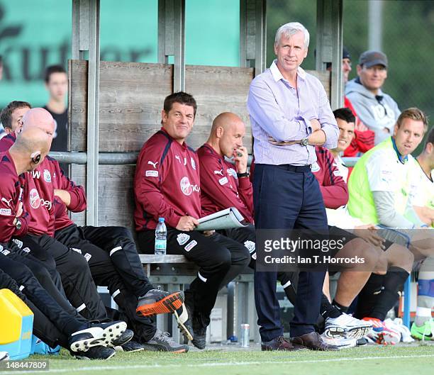 Newcastle United Manager Alan Pardew smiles during a pre season friendly match between Newcastle United and AS Monaco at the Hacker-Pschorr Sports...