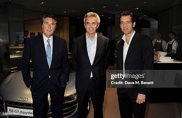 Bryan Ferry, Audi board member Peter Schwarzenbauer and Clive Owen attend a party celebrating the global launch of Audi City, Audi's first digital...