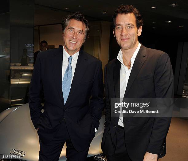 Bryan Ferry and Clive Owen attend a party celebrating the global launch of Audi City, Audi's first digital showroom, featuring an art installation by...