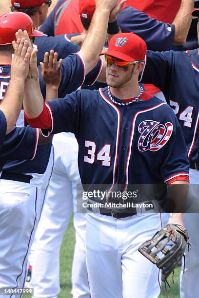 Bryce Harper of the Washington Nationals celebrates a win after a baseball game against the San Francisco Giants on July 4, 2012 at National Park in...