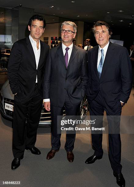 Clive Owen, Audi Chairman Rupert Stadler and Bryan Ferry attend a party celebrating the global launch of Audi City, Audi's first digital showroom,...
