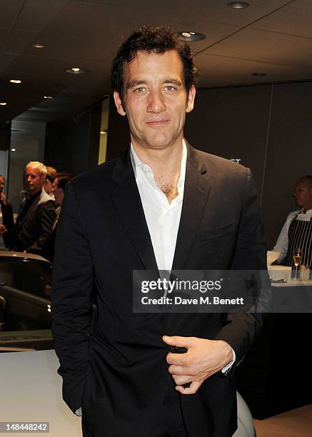 Clive Owen attends a party celebrating the global launch of Audi City, Audi's first digital showroom, featuring an art installation by Chris...