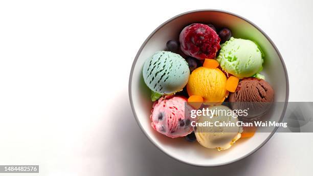 overhead view of mix of different ice-cream flavors in round scoop - eisbecher stock-fotos und bilder