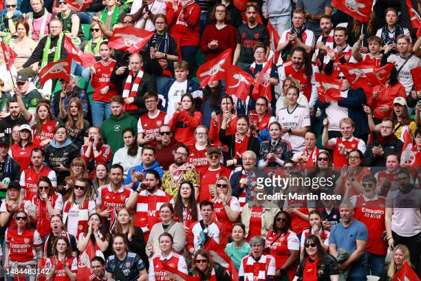 Arsenal fans show their support during the UEFA Women's Champions League Semi Final 1st Leg match between VfL Wolfsburg and Arsenal at Volkswagen...