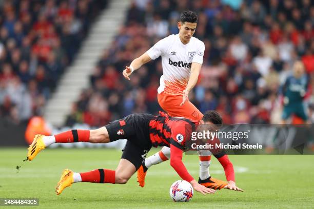 Nayef Aguerd of West Ham United fouls Kieffer Moore of AFC Bournemouth during the Premier League match between AFC Bournemouth and West Ham United at...