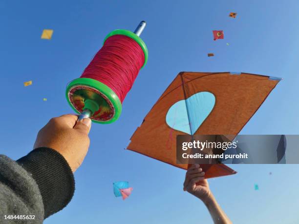kites flying festival, gujarat, india - makar sankranti stock pictures, royalty-free photos & images