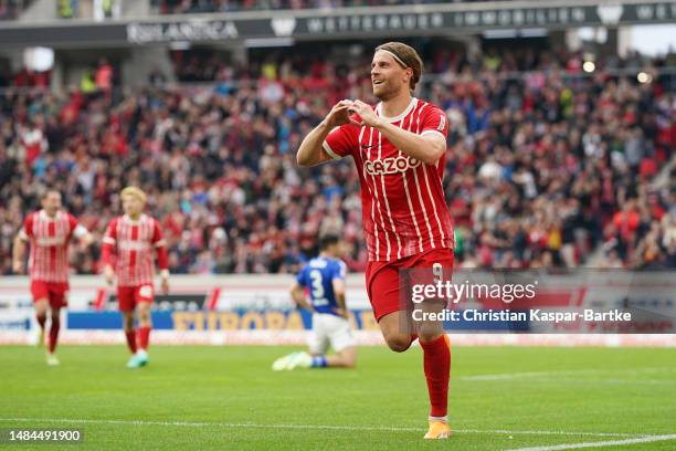 Lucas Hoeler of Sport-Club Freiburg celebrates after scoring the team's third goal during the Bundesliga match between Sport-Club Freiburg and FC...