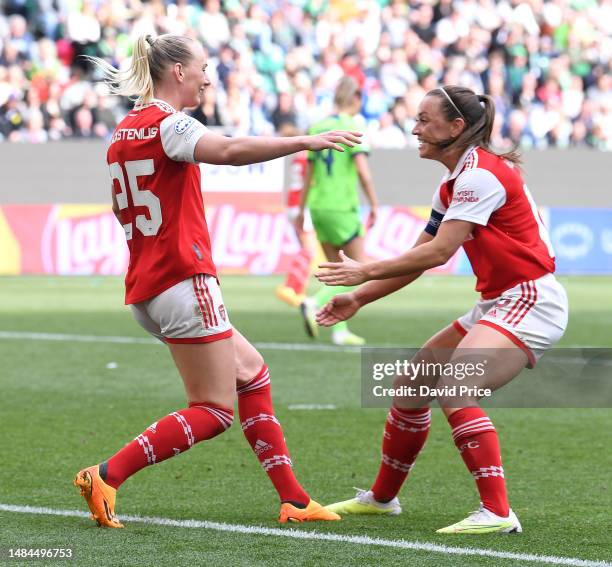 Stina Blackstenius of Arsenal celebrates with teammate Katie McCabe after scoring the team's second goal during the UEFA Women's Champions League...