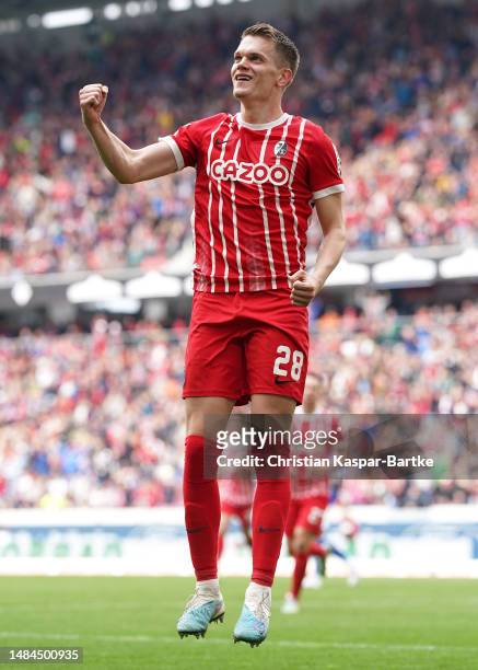 Matthias Ginter of Sport-Club Freiburg celebrates after scoring the team's fourth goal during the Bundesliga match between Sport-Club Freiburg and FC...