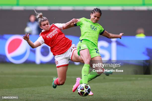 Laura Wienroither of Arsenal battles for possession with Sveindis Jane Jonsdottir of VfL Wolfsburg during the UEFA Women's Champions League Semi...
