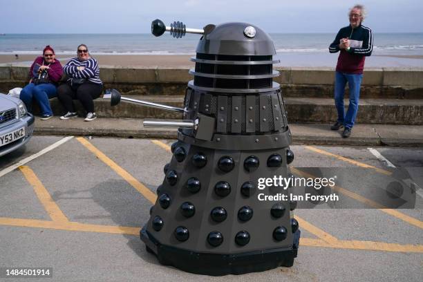 Dalek makes its way along the promenade on the second day of the Scarborough Sci-Fi weekend on April 23, 2023 in Scarborough, England. The North...