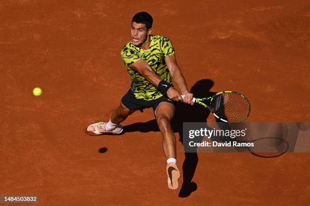 Carlos Alcaraz of Spain plays a backhand shot during the Men's Singles Final on Day Seven of the Barcelona Open Banc Sabadell 2023 at Real Club De...