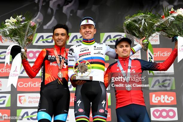 Santiago Buitrago of Colombia and Team Bahrain - Victorious on third place, race winner Remco Evenepoel of Belgium and Team Soudal - Quick Step and...