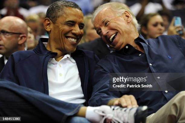 President Barack Obama and Vice President Joe Biden share a laugh as the US Senior Men's National Team and Brazil play during a pre-Olympic...