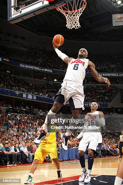 LeBron James of the 2012 US Men's Senior National Team dunks while playing against the Brazilian Men's Senior National Team at the Verizon Center on...