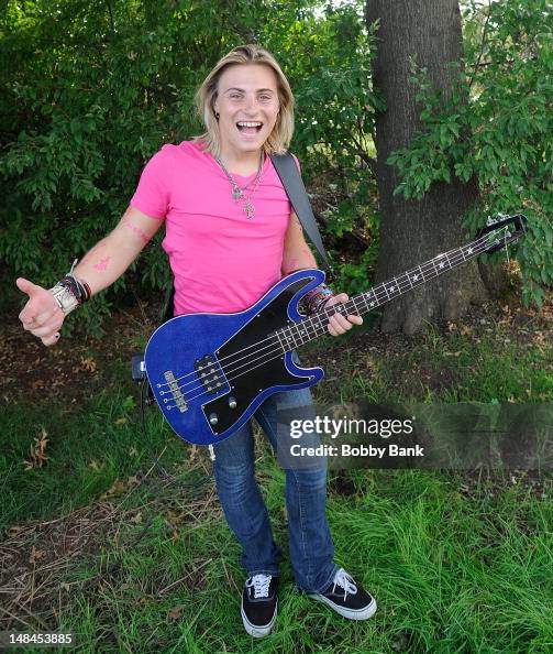 Romzek Bass guitarist Troy Romzek of the group Wellington performs on July ...