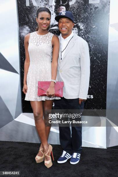 Russell Simmons and Miss Universe Leila Lopes attend "The Dark Knight Rises" premiere at AMC Lincoln Square Theater on July 16, 2012 in New York City.