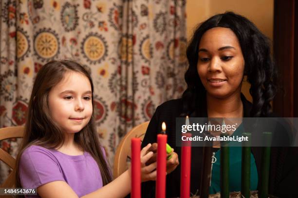 kwanzaa mom and daughter bond ms horizontal - kwanzaa stock pictures, royalty-free photos & images